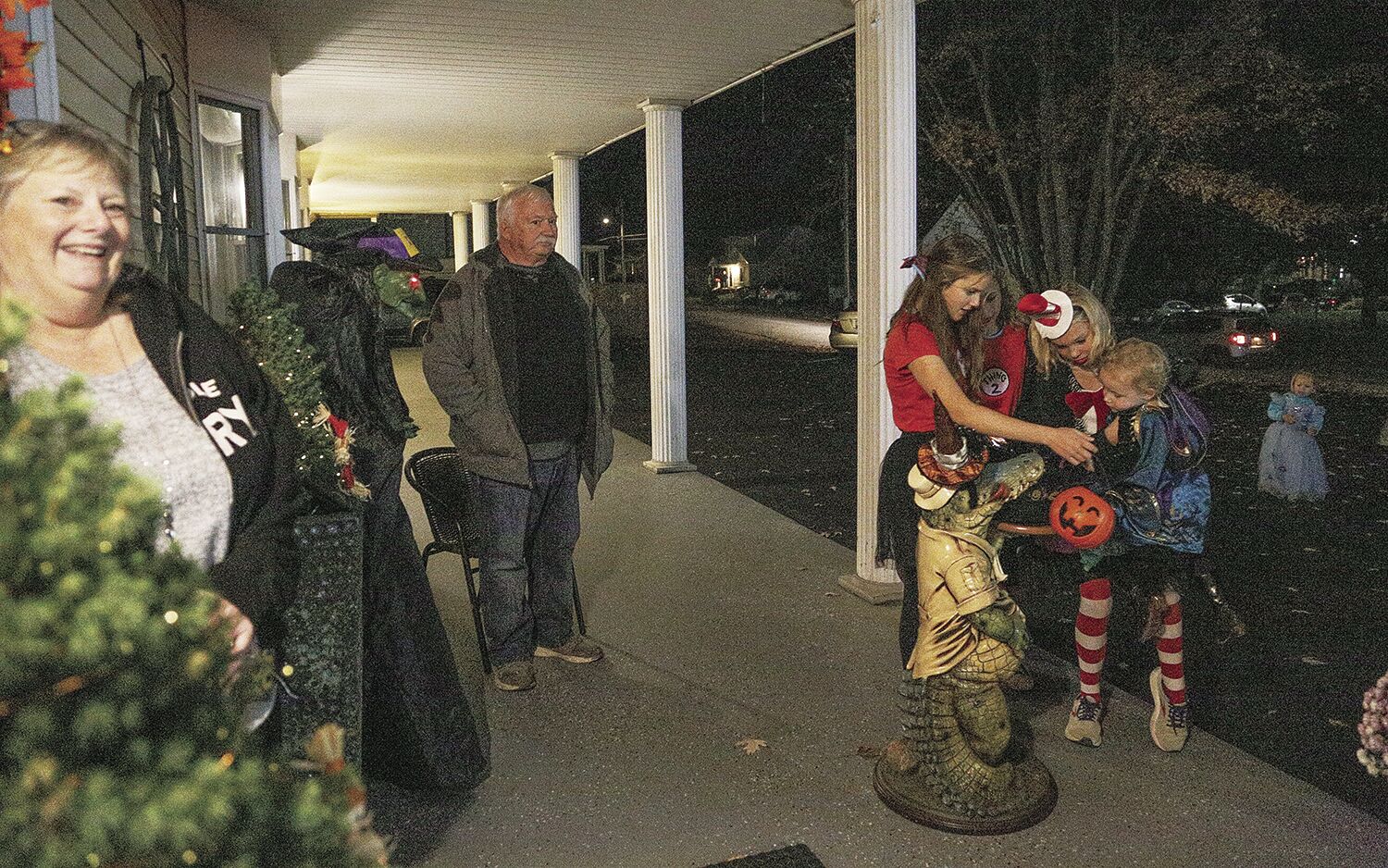 10-31-21 Halloween handing out candy wide